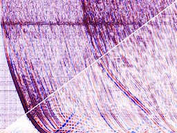 Noisy distributed acoustic sensing recording next to its denoised reconstruction